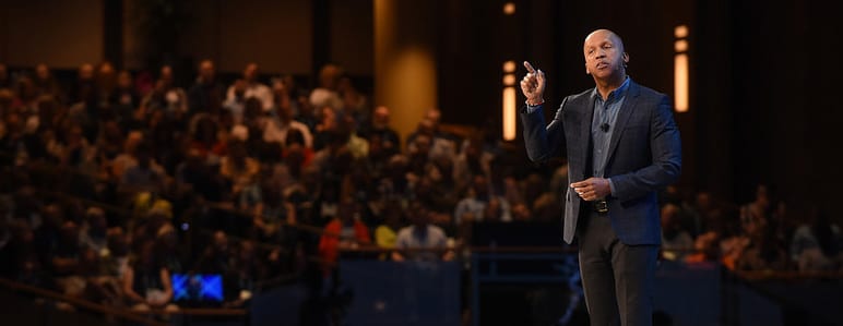 Bryan Stevenson talks from the Summit stage in 2017.