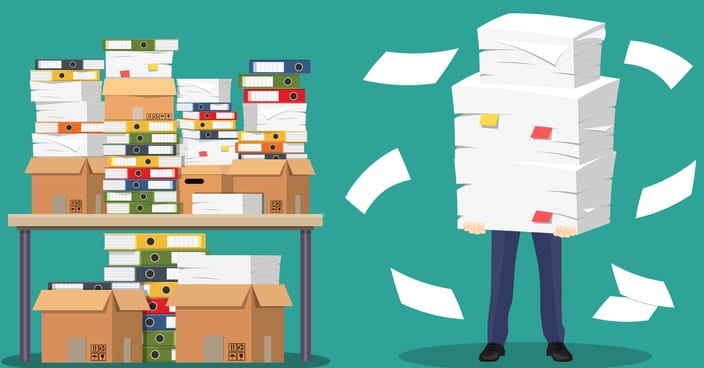 Businessman holds pile of office papers and documents. Documents and file folders on table. Routine, bureaucracy, big data, paperwork, office.
