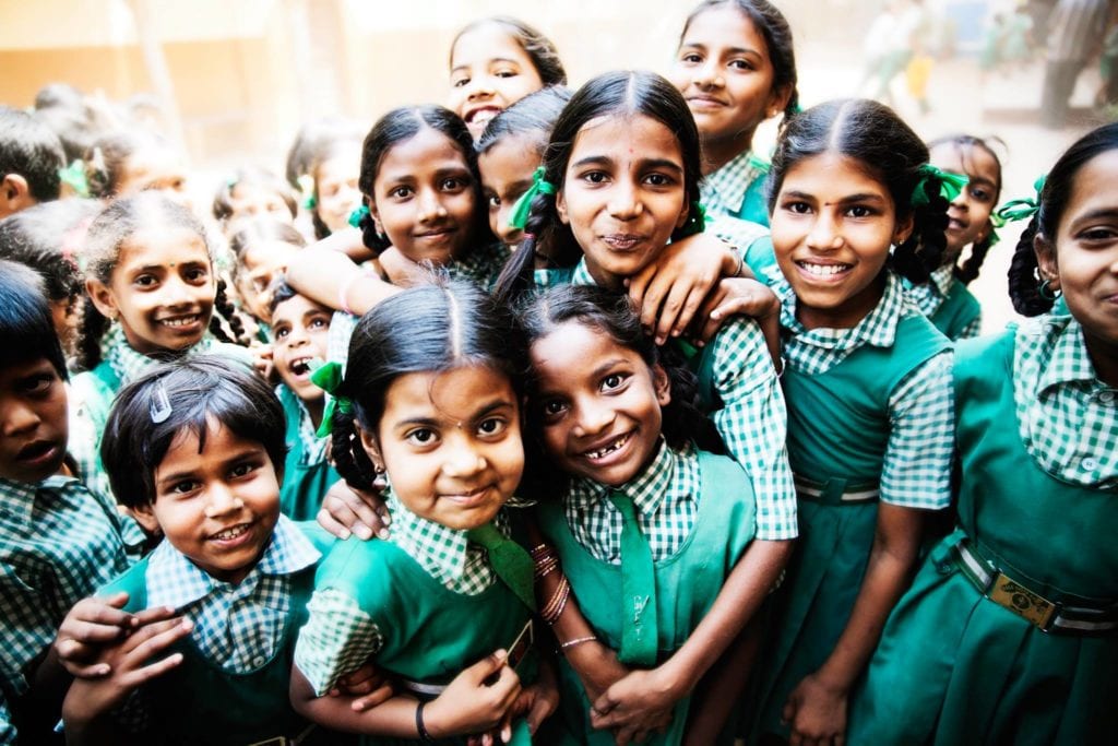 School girls smiling