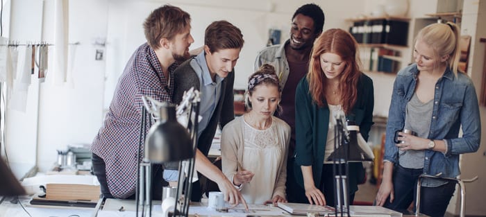 Close up of a coworkers working together on a project